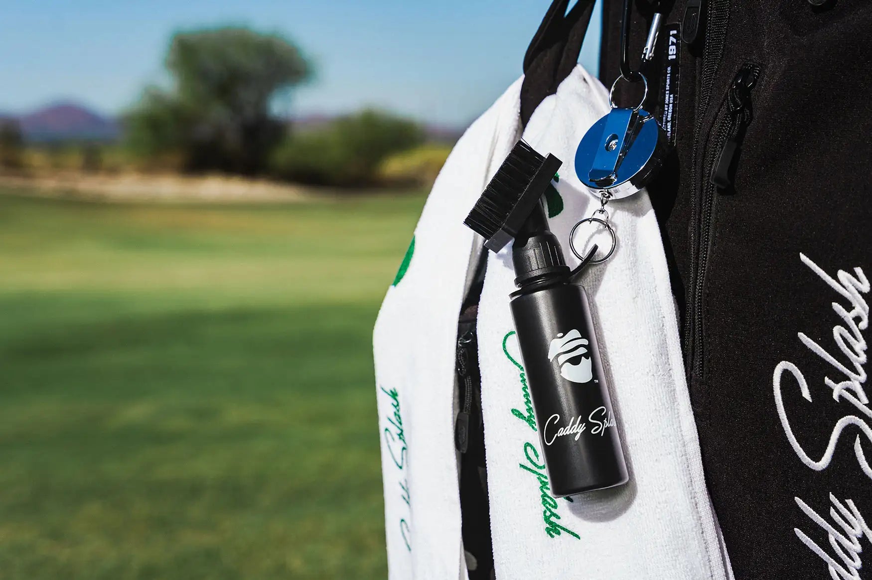 Caddy Splash Golf Cleaning Brush attached to golf Bag with Caddy Splash Cleaning Towel