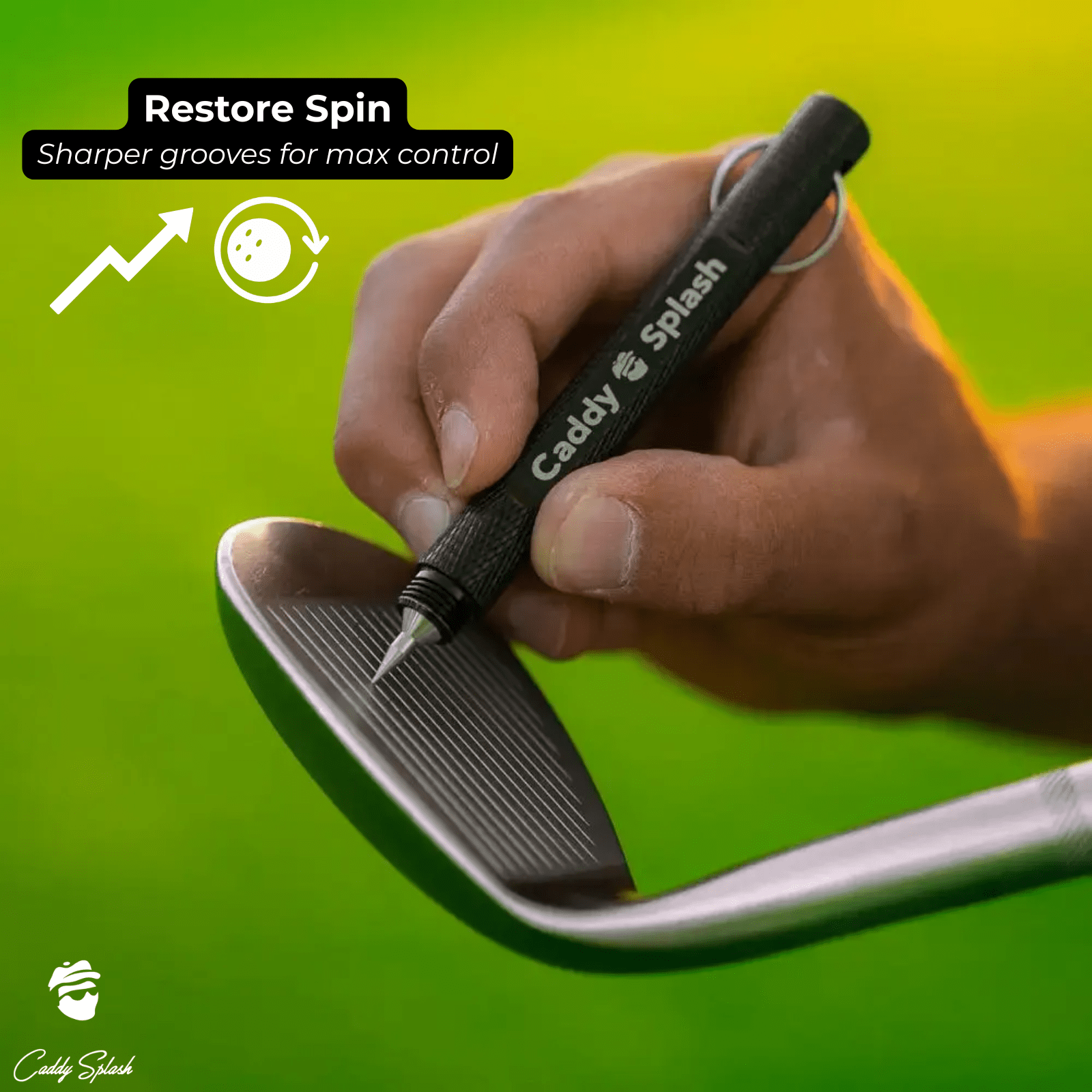 Hand holding a golf club with a Caddy Splash groove sharpener tool against a green background increasing spin
